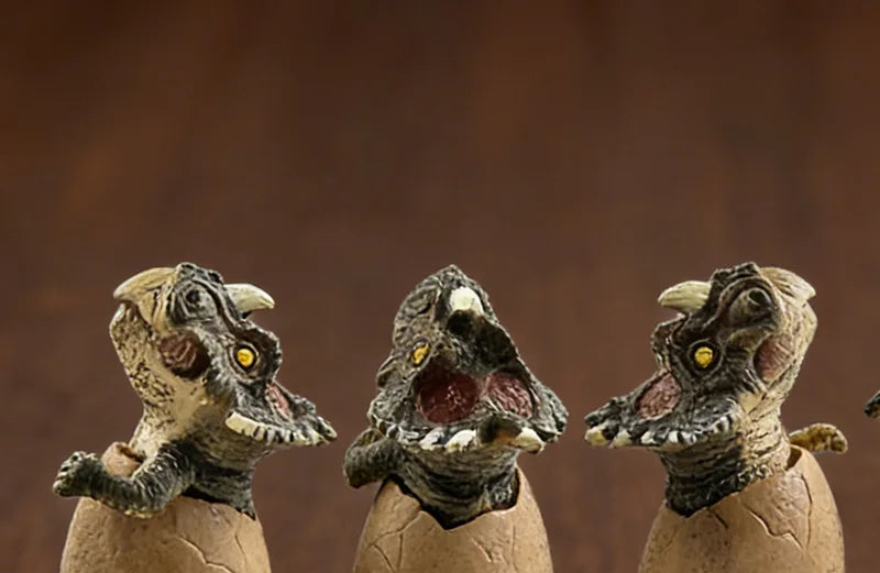 3PCS Hatching Dinosaur Eggs – T‑Rex, Triceratops & Raptor PVC Model Set